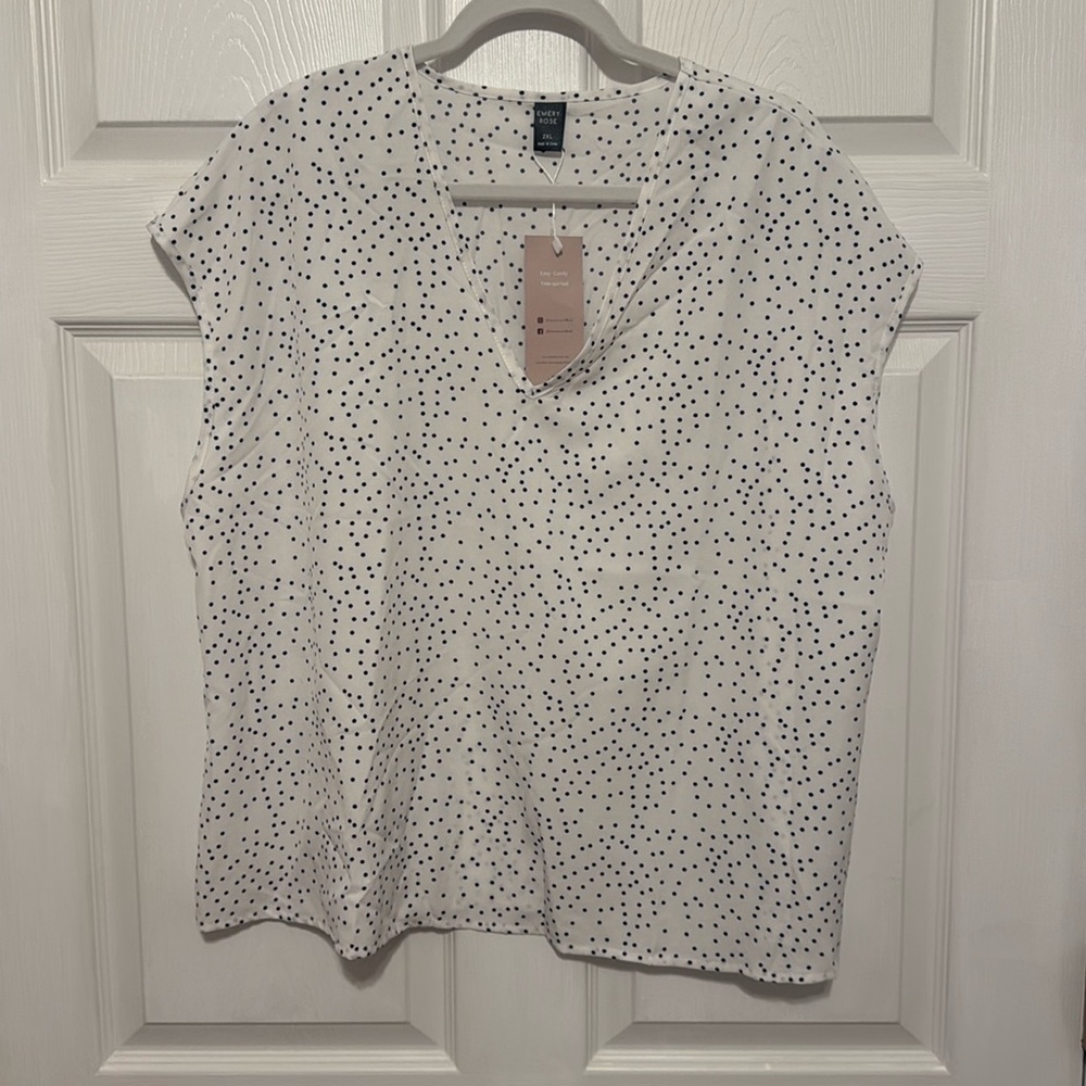 White and black polka dot blouse
